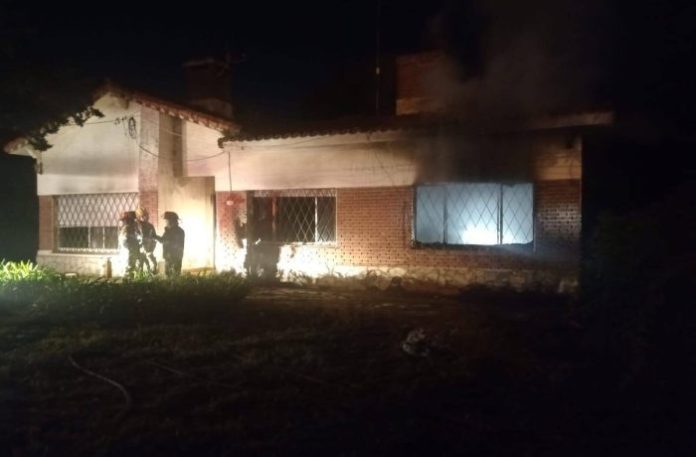 Casa incendiada Open Door